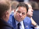 Jeff Gorton, the Canadiens' executive vice president of hockey operations, speaks with members of his management team during NHL draft at the Bell Center in Montreal on July 7, 2022.