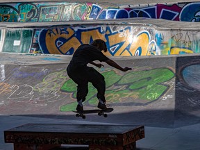 Skateboarder Lachlan Roch practices his moves at the Van Horne skateboard park in Montreal Sept. 14, 2022.