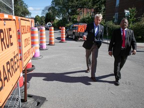 Traffic expert Rick Leckner, left, and Ensemble Montréal infrastructure critic Alan DeSousa are calling on the city to better co-ordinate construction sites affecting Montreal's roads.