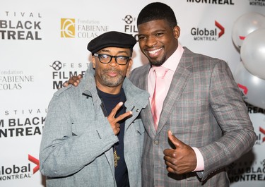 P. K. Subban and American filmmaker Spike Lee pose for photograph before the screening of Lee's film Da Sweet Blood of Jesus for the Montreal International Black Film Festival on Sept. 24, 2014.