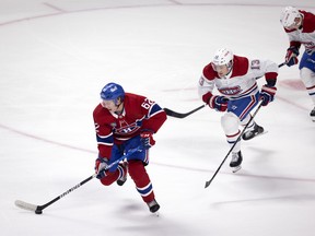 Montreal Canadiens Owen Beck (62) leads the pack as Mitchell Stephens (13) and Otto Leskinen (47) fall behind during an inter-squad scrimmage game in Montreal, on Sunday, Sept. 25, 2022.