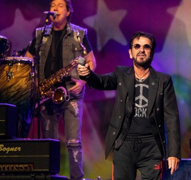 Ringo Starr is seen with Warren Ham on sax on the Place Bell stage in Laval on Monday, Sept. 26, 2022.