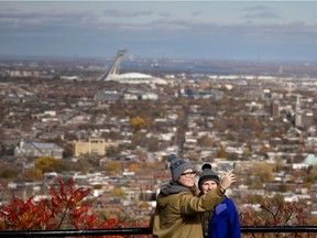 Stephanie Consul, left, and Rhianna Rae take a selfie in the fall of 2020 at the lookout on Camillien-Houde Rd. on Mount Royal in Montreal.