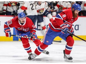 Montreal Canadiens Victor Mete, left, teams up on defence with Jordie Benn during second period against the Florida Panthers in Montreal on Sept. 29, 2017.