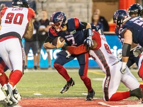 Montreal Alouettes quarterback Trevor Harris (#7) can't get through the Ottawa Redblacks defensive line during 1st half CFL action at Percival Molson Stadium in Montreal on Friday September 2, 2022.