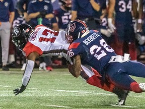 Alouettes linebacker Tyrice Beverette tackles Redblacks wide-receiver DeVonte Dedmon last week at Molson Stadium. Montreal was guilty of numerous missed tackles during the game.