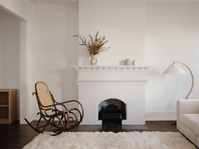 The fireplace mantel is an original element of the home that inspired its redesign.