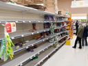 Empty shelves are seen in a grocery store as shoppers stock up on food in advance of Hurricane Fiona making landfall in Halifax on Friday, Sept. 23, 2022. The storm was also making a beeline for parts of Quebec. 