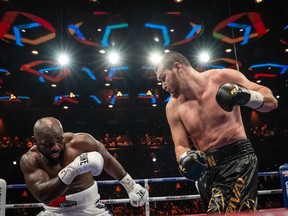 Montreal's Arslanbek Makhmudov and Cameroon's Carlos Takam battle during a heavyweight title fight at le Cabaret at the Casino de Montreal, Friday, September 16, 2022 in this handout photo. After a tough fight, Montreals Arslanbek Makhmudov retained his NABA and NABF heavyweight titles and added the WBC SILVER to his collection by beating Cameroon's Carlos Takam by unanimous decision.