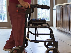 A senior uses a walker