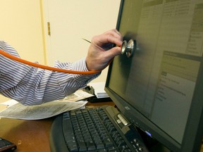 An Ontario doctor advocating for electronic medical records poses for a photo illustration. "Family doctors and specialists want a (Dossier Santé Québec) that meets their day-to-day needs," Montreal physician Norman Sabin writes.
