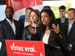 Recent comments by the CAQ’s François Legault and Jean Boulet “are dividing Quebecers, and they are false on top of that,” said Quebec Liberal Leader Dominique Anglade, alongside candidates in Quebec City on Wednesday, Sept. 28, 2022.