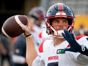 Montreal Alouettes quarterback Trevor Harris warms up before facing the Tiger-Cats in Hamilton, Ont., on July 28, 2022.