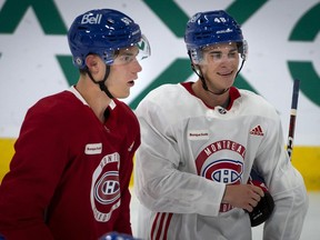 Montreal Canadiens top draft picks Juraj Slafkovsky, left, and Filip Mesár, both from Slovakia, take a break after skating drills at the Bell Sports Complex in Brossard, Que., during day one of their evaluation camp on Monday, July 11, 2022. Slafkovsky set up Mesár for a goal against Buffalo in the first game of the 2002 Prospects Challenge in Buffalo on Thursday, Sept. 15, 2022.