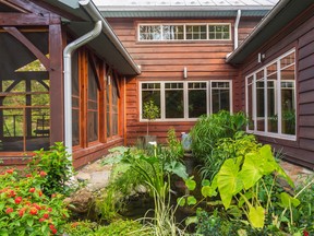 The exterior pond, built by Jean Brulé of Jardins Aquadesign, can be seen from several rooms.