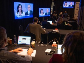 reporters watch the Quebec leaders' debate