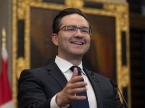 Conservative Leader Pierre Poilievre smiles as a reporter asks him questions during his opening remarks in the Foyer of the House of Commons in Ottawa Tuesday, Sept. 13, 2022. Poilievre's success in Quebec during the recent federal Conservative leadership race is a good sign for the Conservative Party of Quebec, political analysts and provincial Conservatives say.