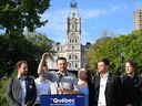 Parti Québécois Leader Paul St-Pierre Plamondon speaks at a news conference in front of the legislature, Thursday, September 8, 2022  in Quebec City, flanked by local candidates. Quebecers are going to the polls for a general election on Oct. 3.