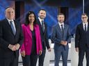 From left, Coalition Avenir Quebec Leader Francois Legault, Quebec Liberal Leader Dominique Anglade, Parti Quebecois Leader Paul St-Pierre Plamondon, Quebec Solidaire Leader Gabriel Nadeau-Dubois and Quebec Conservative Leader Eric Duhaime pose on set prior to a leaders debate in Montreal, on September 22, 2022. Quebecers will go to the polls on October 3rd.