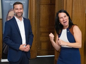 Québec solidaire co-spokesperson Gabriel Nadeau-Dubois meets with Montreal Mayor Valérie Plante while campaigning Monday, Sept. 26, 2022 in Montreal.