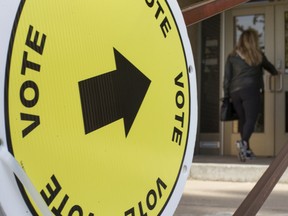 A "Vote" sign is displayed outside a polling station in Montreal on Monday, Oct. 1, 2018. Quebecers go to the polls again on Oct. 3. "As we head to the polls Monday, English-speaking Quebecers have the power to make a difference," Eva Ludvig writes.