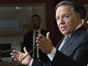 Coalition Avenir du Quebec Leader Francois Legault speaks to the media while campaigning In Longueuil, Que., Monday, Sept. 19, 2022.&ampnbsp;The incumbent premier is starting the day in the Orford riding.&ampnbsp;THE CANADIAN PRESS/Ryan Remiorz