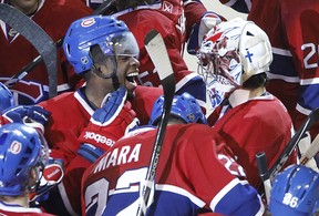 P.K. Subban celebrates an overtimes goal with Carey Price at the Bell Centre on April 5, 2011.