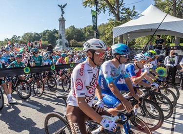 Riders wait for the start of the Grand Prix Cyclistes race in Montreal on Sept. 11, 2022.