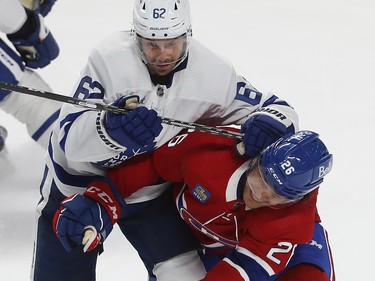 Toronto Maple Leafs' Denis Malgin (62) makes his way past Montreal Canadiens' Johnathan Kovacevic (26) during third period NHL action in Montreal on Wednesday October 12, 2022.