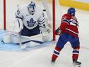 Montreal Canadiens' Cole Caufield scores his first of two goals on Toronto Maple Leafs' Matt Murray during second period at the Bell Centre in Montreal on Oct. 12, 2022.