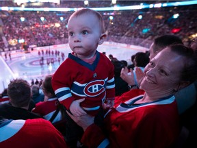 Thirteen-month old Edouard Francoeur attends his first Montreal Canadiens game at the Bell Centre with mother Bianca Jette and father Martin Francoeur as the Habs faced the Toronto Maple Leafs on Oct. 12, 2022.