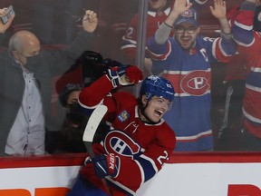 Canadiens' Cole Caufield (22) celebrates his first of two goals scored on Toronto Maple Leafs goaltender Matt Murray during second period NHL action in Montreal on Wednesday Oct. 12, 2022.