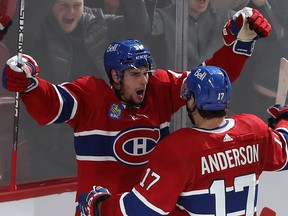 Sean Monahan celebrates his third-period goal with Josh Anderson at the Bell Centre on Wednesday night.