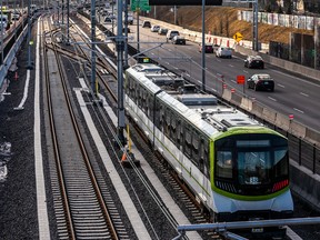 REM cars are tested on a small stretch of line between the Samuel-de-Champlain Bridge the Panama REM station in Brossard on Tuesday, March 22, 2022.