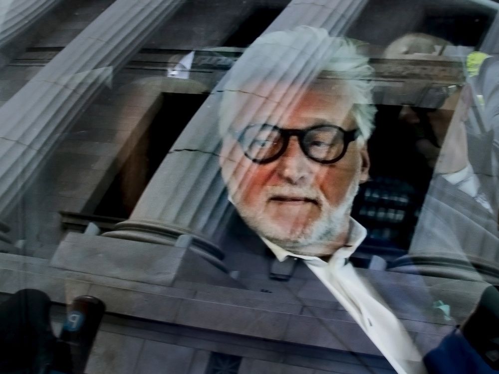 gilbert rozon looks out from a vehicle after leaving the quebec court of appeal in montreal on may 16, 2019.