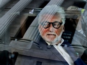 Gilbert Rozon, looks out from a vehicle after leaving the Quebec Court of Appeal in Montreal on May 16, 2019. He was before the Quebec Court of Appeal in the case of a sexual assault suit against him.