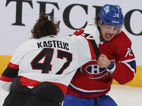 Montreal Canadiens Arber Xhekaj (72) gets into fight with Ottawa Senators' Mark Kastelic (47) during first period pre-season NHL action in Montreal on Tuesday Oct. 4, 2022.