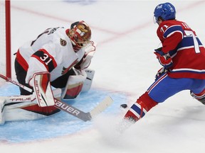 Montreal Canadiens' Jake Evans (71) gets up close on Ottawa Senators goaltender Anton Forsberg during third period pre-season NHL action in Montreal on Tuesday Oct. 4, 2022.