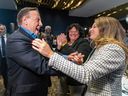 Premier François Legault greets his new Coalition Avenir Québec caucus in Brossard on Thursday, October 6, 2022 following their overwhelming victory in Monday’s provincial election.