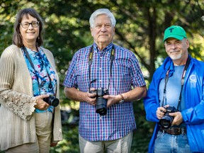 Lakeshore Camera Club members Jane Melrose, Norm Horner and Cameron Tilson, right, outside Stewart Hall in Pointe-Claire.