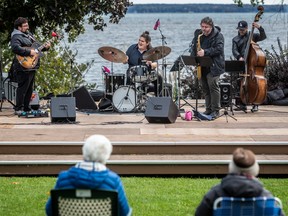 The Maximw Racicot Jazz Quartet, featuring Maxime Racicot, guitar; Patrice Luneau, saxophone; Jonathan-Guillaume Boudreau, double bass; Vincent Ravary, drums, perform outside Stewart Hall in Pointe-Claire on Saturday.