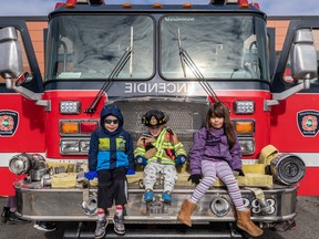 Fire Station 61, originally opened in 1967, is home to the Service de securite incendie de Montreal and the Dollard-des-Ormeaux Municipal Patrol. Residents like Alex Di Marzio, 5 years old, Andrew Traicheff, 2 years old and Sofia Di Marzio, 7 years old, checked out the fire truck during an open house on Saturday.