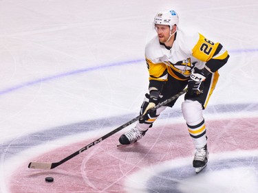 Penguins' Jeff Petry carries the puck through the neutral zone during his first game against the Montreal Canadiens, his former team, in the second period at the Bell Centre on Montreal on Oct. 17, 2022.