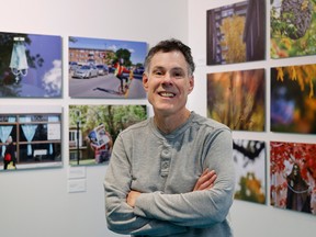 Montreal photographer Daniel Wiener is seen with his exhibition Familiar Streets, Extraordinary Times in and Around Côte-des-Neiges, in Montreal on Wednesday, Oct. 19, 2022.