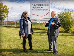 Kirkland residents Lindsay Francis and Magdy Boghdady have a conversation recently outside the former Merck Frosst campus. The two were part of a committee of residents dealing with promoter Prével over how to develop the property.