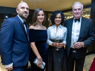 Sanel Sehic and his wife, Marie-Éve St-Arnaud, left, with Ariéla and Richard Hylands at a fundraiser cocktail for La Fondation immobilière de Montréal pour les jeunes at the Queen Elizabeth Hotel in Montreal on Friday, Oct. 21, 2022.