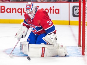 Montreal Canadiens' Jake Allen makes a save during second period against the Arizona Coyotes in Montreal on Oct. 20, 2022.