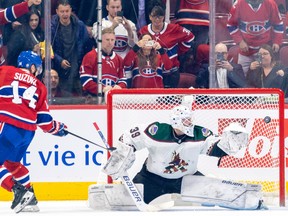 Canadiens captain Nick Suzuki beats Arizona goalie Connor Ingram on a penalty shot during second period of Thursday night’s 6-2 win over the Coyotes at the Bell Centre.