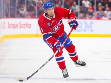 Canadiens defenceman Chris Wideman shoots the puck from the point during the first period of a National Hockey League game against the Arizona Coyotes in Montreal Thursday Oct. 20, 2022.