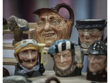 A Royal Doulton Toby Mug called John Barleycorn (rear, left) and other Toby Mugs at a vintage bazaar at Saint-Jean-Berchmans Church in Montreal on Sunday, Oct. 23, 2022.